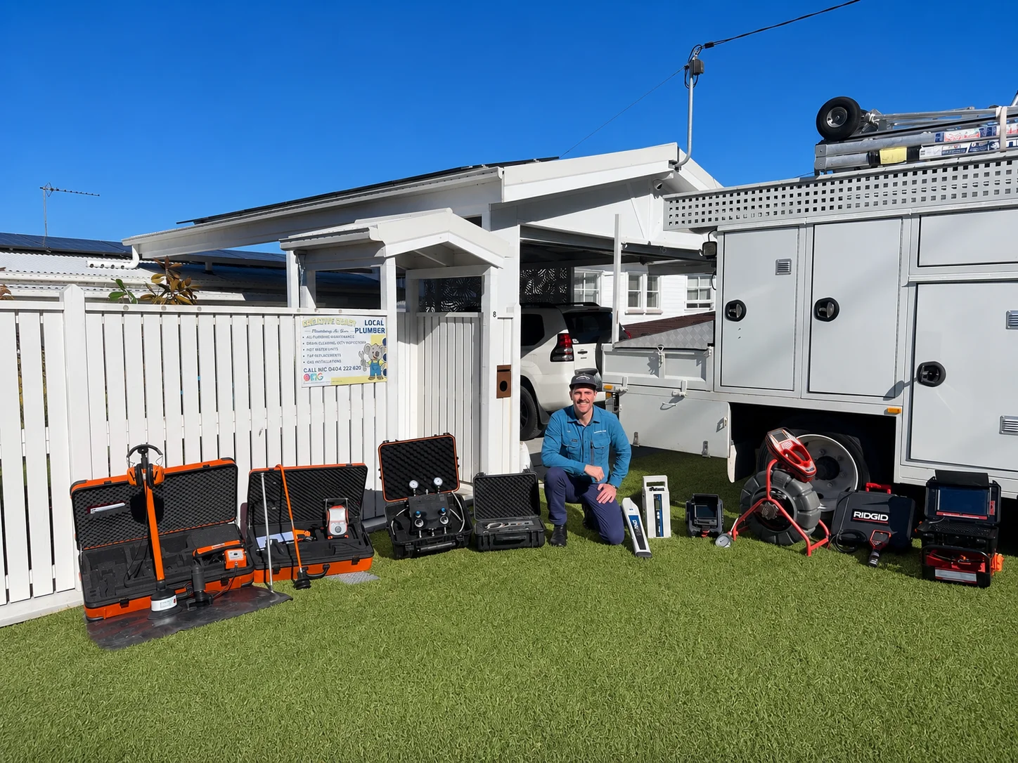 Nic from Creative Coast Plumbing & Gas with his full leak detection equipment kit and service truck on the Gold Coast