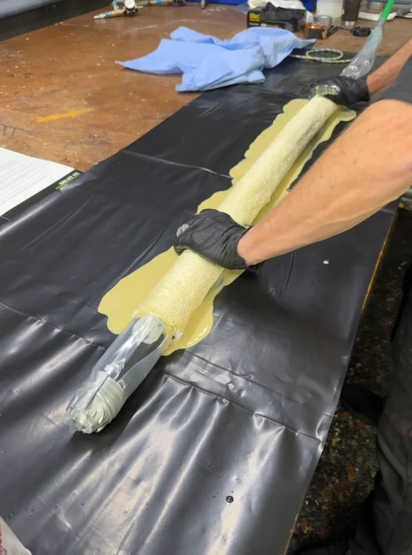 Resin-impregnated pipe relining liner being prepared for a Gold Coast trenchless repair